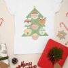 white tshirt with a christmas tree with character ornaments