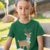 sweet girl in a green tshirt with Reindeer with christmas lights