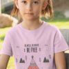 Cute girl in a Light Pink Be Wild Be Brave Be Free tshirt