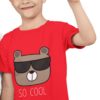 Charming boy in a red Tshirt with a bear wearing sunglasses