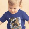 adorable little boy with a Police dog on a Deep blue tshirt