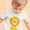 adorable little boy in a white tshirt with a cute lion
