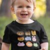 adorable little boy in a black tshirt with Cute animal faces