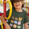 cheerful little boy in an olive green tshirt with Cute animal faces
