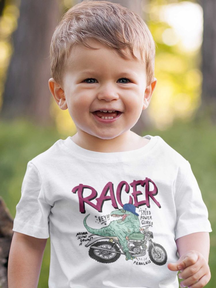 Adorable Boy In A Dino Racer White Tshirt