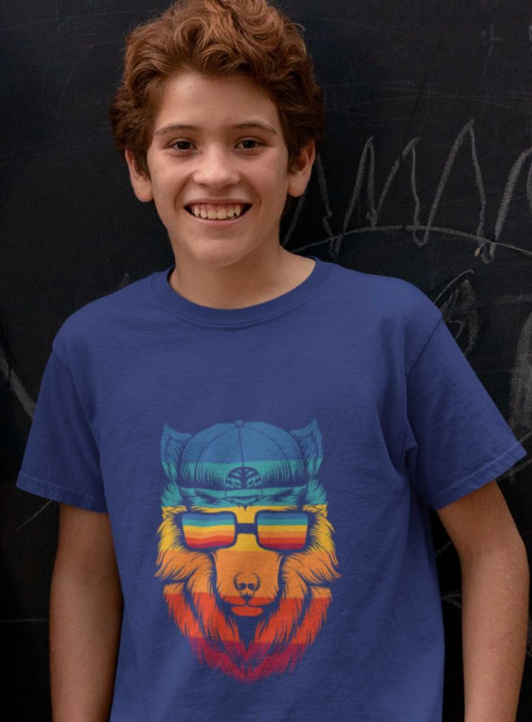 Smiling Boy In A Deep Blue Tshirt With A Cool Wolf