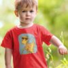 adorable little boy in a red tshirt with Dinosaur holding a fishing rod